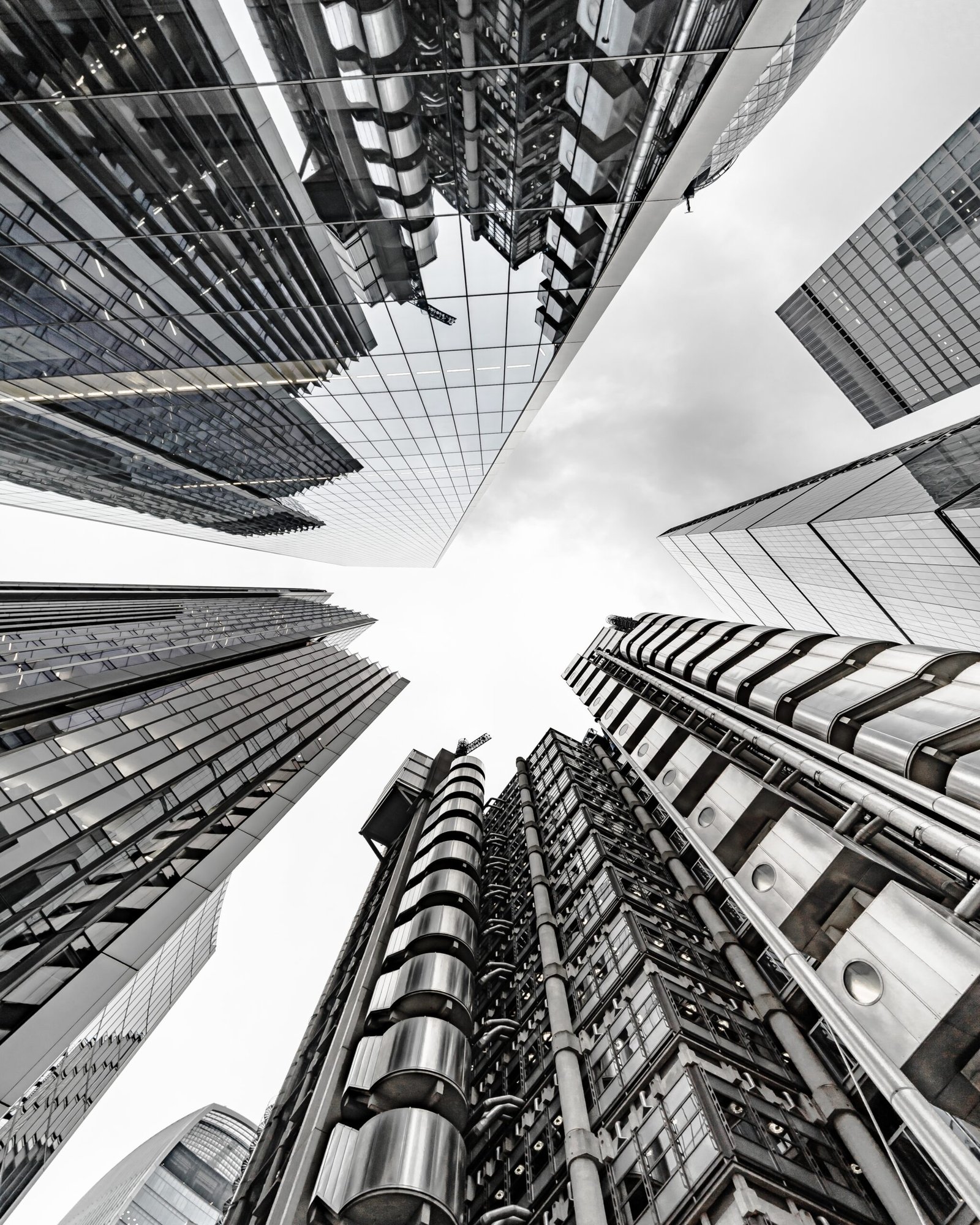 vertical low angle shot of a modern business building scenery touching the sky